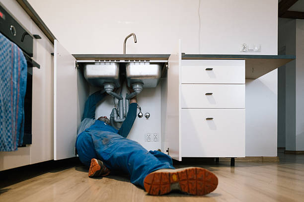 Professional Drain Cleaning technician working in Somerville, TX